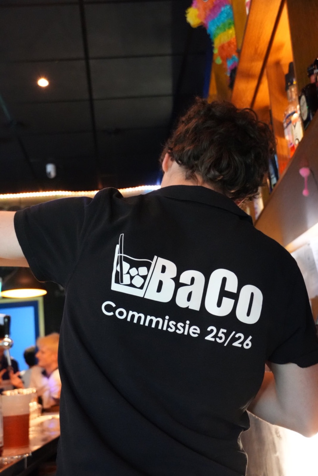 BaCo logo printed on a committee polo shirt